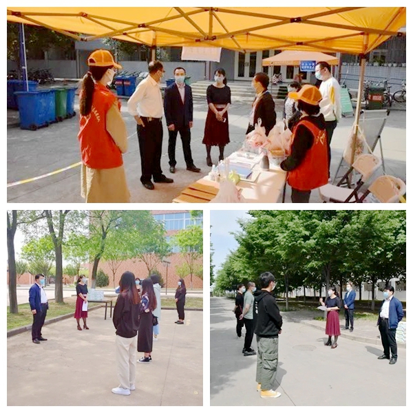 院领导看望值班志愿者及返校学生.jpg